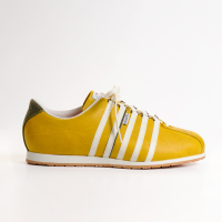 Sneaker Citrin im sommerlichen Gelb. Der sportlich - elegante Schuh mit weissen K&#252;nzli-Streifen f&#252;r l&#228;ssige Freizeitlooks aus Leder. Edelsneaker